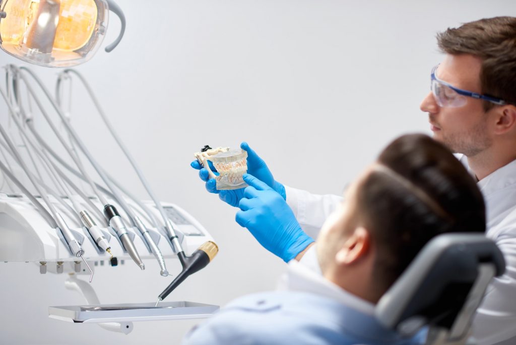 Professional dentist at his clinic